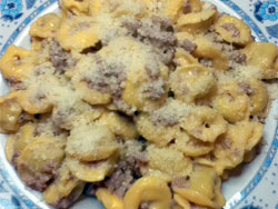 Tortellini with sausage and mushroom cream