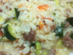 Risotto zucchine e salsiccia Risotto zucchine e salsiccia