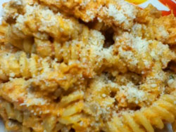 Fusilli con zucca e salsiccia Fusilli con zucca e salsiccia