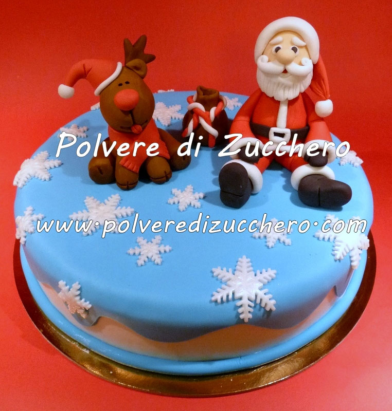 Torta di natale con la renna buffa e babbo natale Torta di natale con la renna buffa e babbo natale