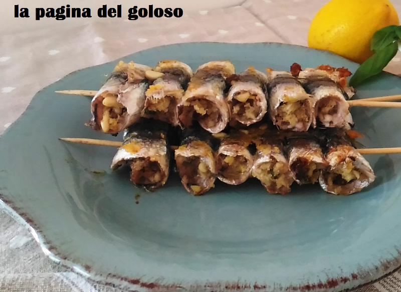 Involtini di sardine, pinoli limone e uvetta